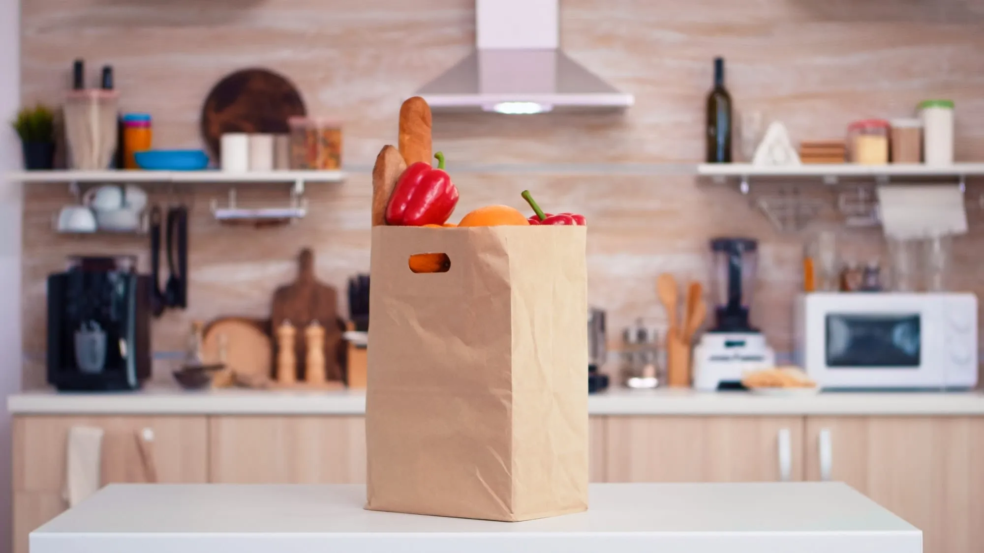 Bag of fresh groceries on a kitchen counter