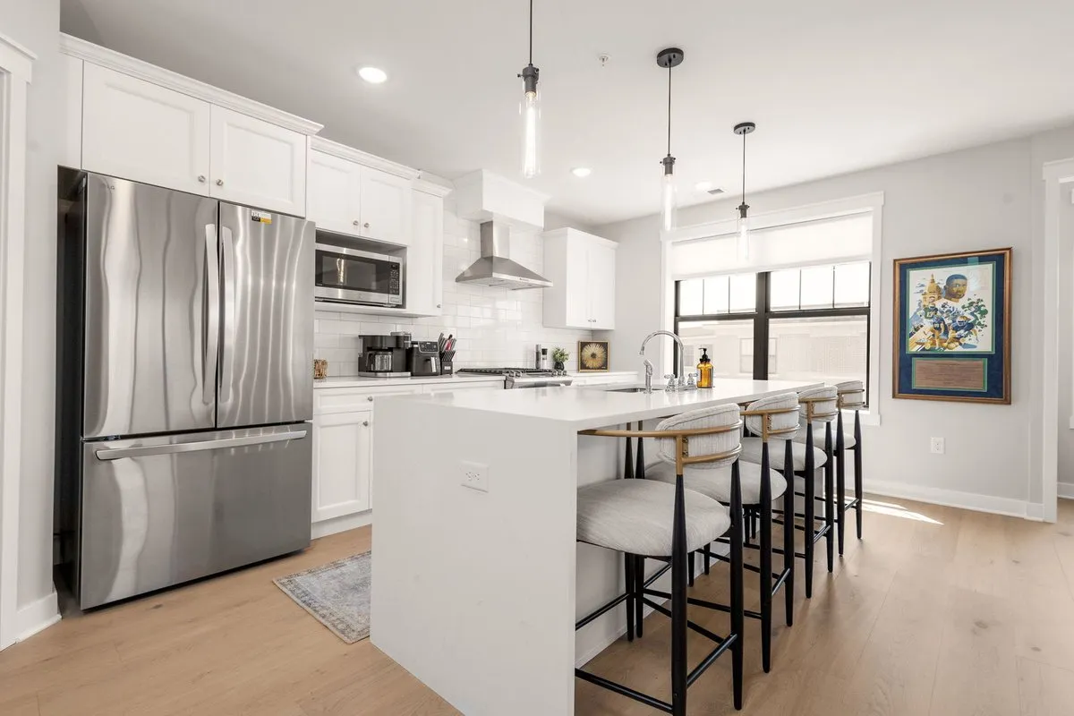 Kitchen with an island and stainless appliances